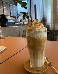 Creamy cold frappe with whipped cream and coffee blend - refreshing iced beverage at Coffee Koffein