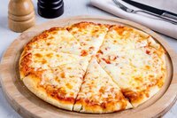Classic Margarita pizza with fresh basil, mozzarella and tomatoes - traditional Italian at Coffee Koffein