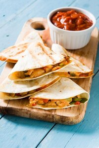 Fresh tacos with seasoned filling and crisp vegetables - Mexican flavor at Coffee Koffein